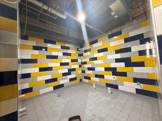 CHS - Auditorium Lobby Toilet Room Tile In Progress